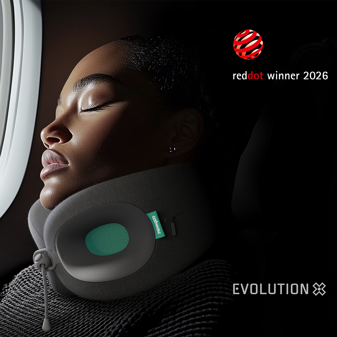 Person using a Cabeau Evolution X neck pillow and Red Dot Award winner logo.
