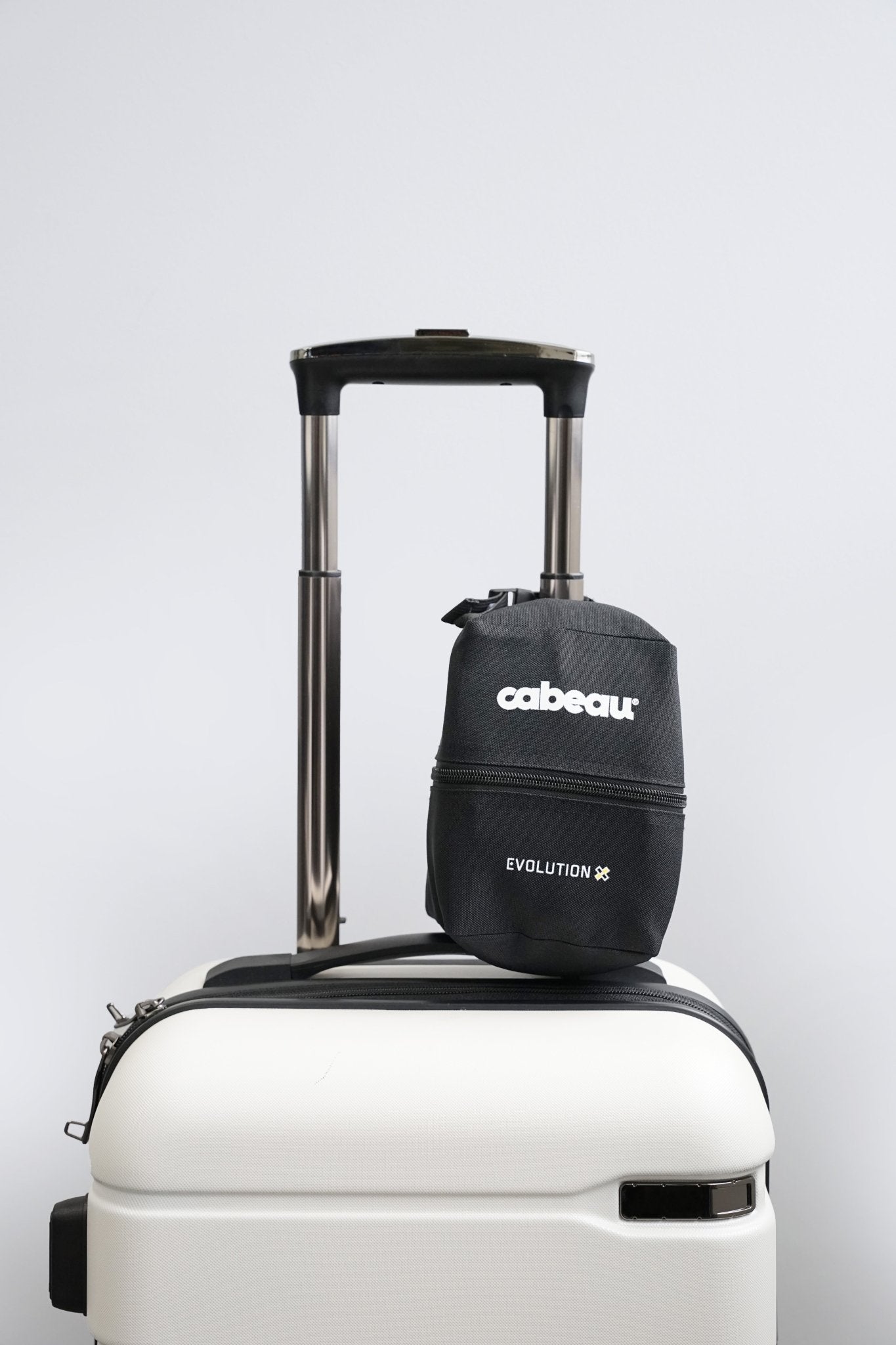 Evolution X Travel Bag - adjustable clasp clips onto luggage